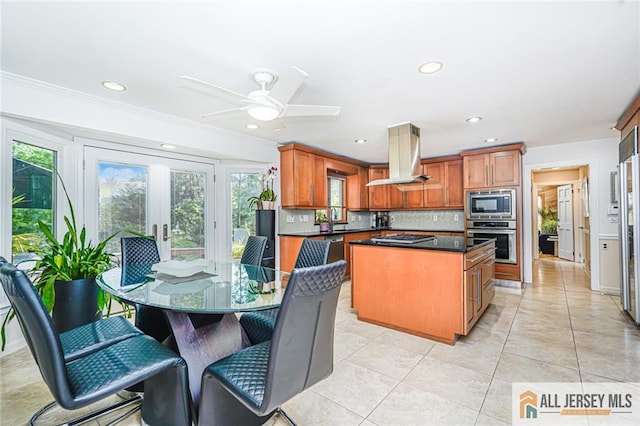 5 Leighton Dr, East Brunswick, NJ 08816 - kitchen featuring stainless steel appliances, island range hood, a center island, recessed lighting, and decorative backsplash