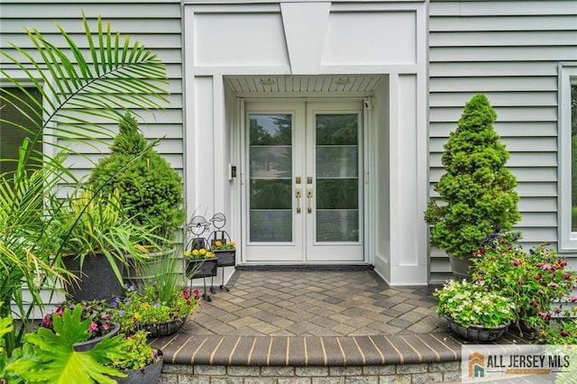 5 Leighton Dr, East Brunswick, NJ 08816 - property entrance with french doors and a patio area