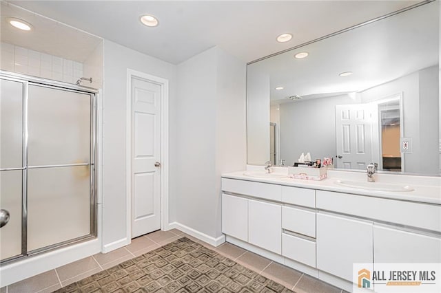5 Leighton Dr, East Brunswick, NJ 08816 - full bath featuring double vanity, a stall shower, recessed lighting, and tile patterned floors