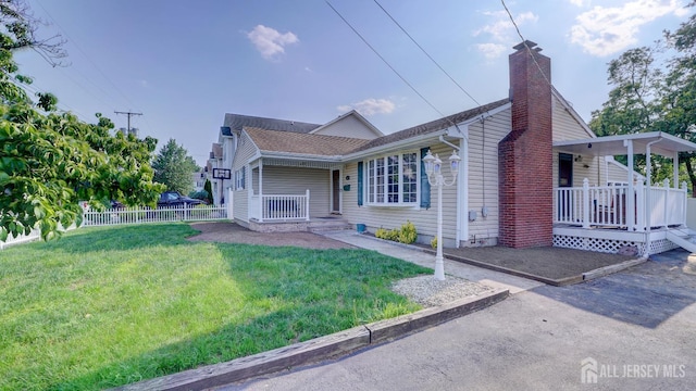 230 Raritan St, South Amboy, NJ 08879 - view of front of property with a porch and a chimney
