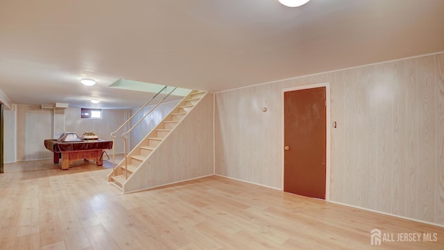 230 Raritan St, South Amboy, NJ 08879 - below grade area featuring wood finished floors, pool table, and stairway