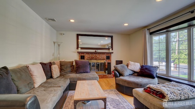230 Raritan St, South Amboy, NJ 08879 - living room with light wood-style floors, recessed lighting, and a fireplace
