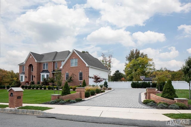 view of front of house with a front lawn