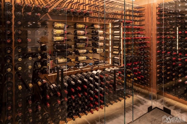 wine area with tile patterned flooring