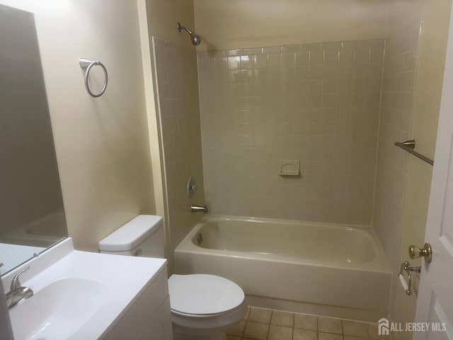 full bathroom featuring toilet, shower / bathtub combination, tile patterned floors, and vanity