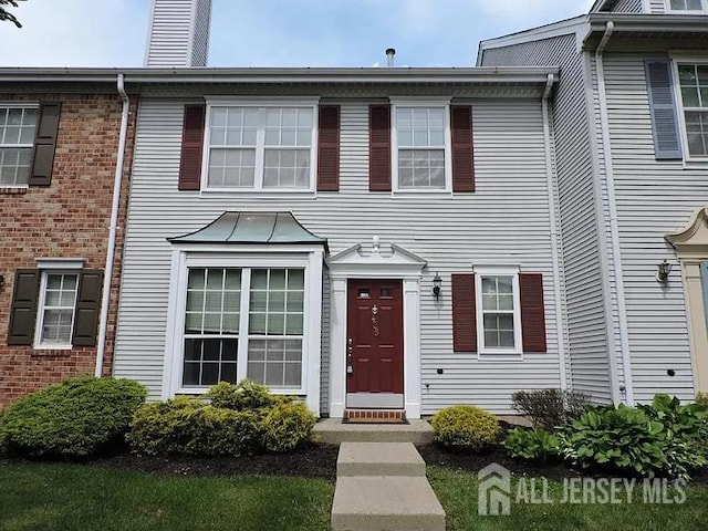 425 Northam Dr, North Brunswick, NJ 08902 - townhome / multi-family property with a chimney