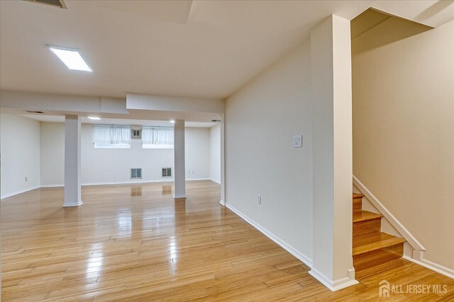 basement with light wood-type flooring