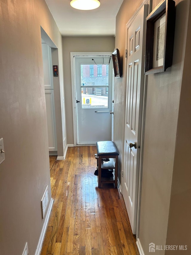 741 Bound Brook Rd, Dunellen, NJ 08812 - entryway with wood finished floors and baseboards