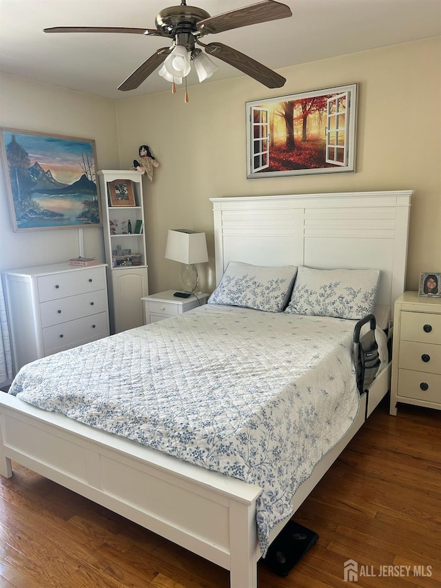 741 Bound Brook Rd, Dunellen, NJ 08812 - bedroom with dark wood finished floors and a ceiling fan