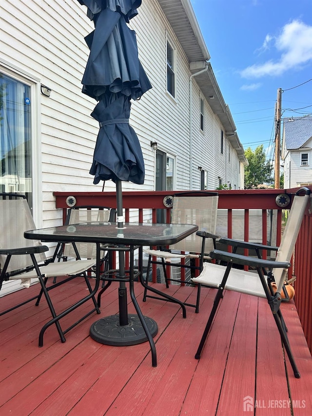 741 Bound Brook Rd, Dunellen, NJ 08812 - wooden deck featuring outdoor dining space