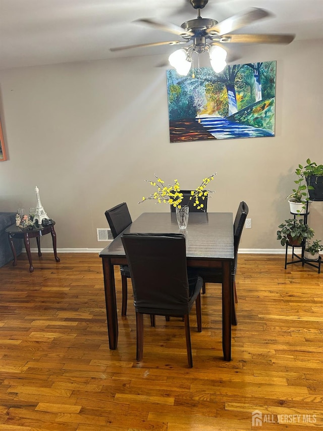 741 Bound Brook Rd, Dunellen, NJ 08812 - dining space with ceiling fan and wood finished floors