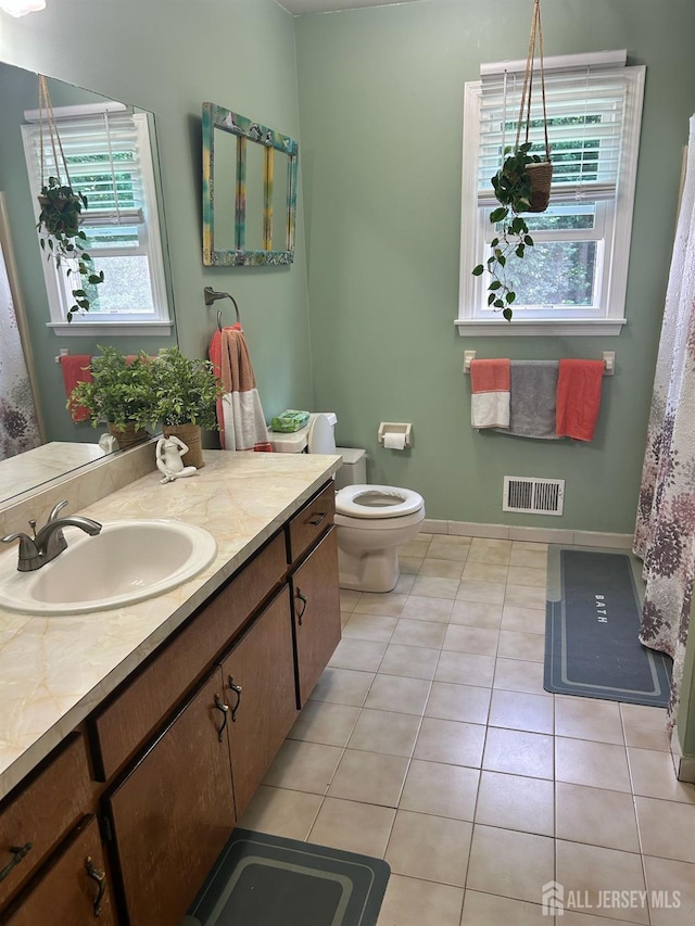 741 Bound Brook Rd, Dunellen, NJ 08812 - bathroom with vanity and tile patterned flooring