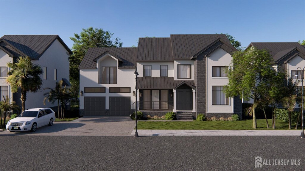 view of front of property featuring stucco siding, a front lawn, driveway, and a balcony
