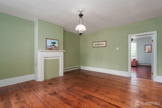 interior space with baseboards, a baseboard heating unit, hardwood / wood-style floors, and a baseboard radiator