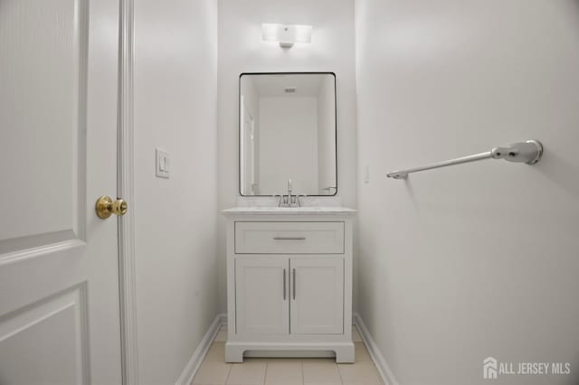 bathroom featuring vanity and tile patterned flooring