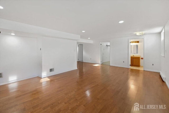 empty room with wood-type flooring