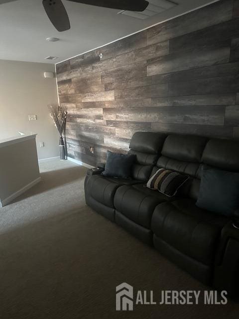 138 N Grabowski Dr Unit 1490, Sayreville, NJ 08859 - carpeted living area with an accent wall and wooden walls