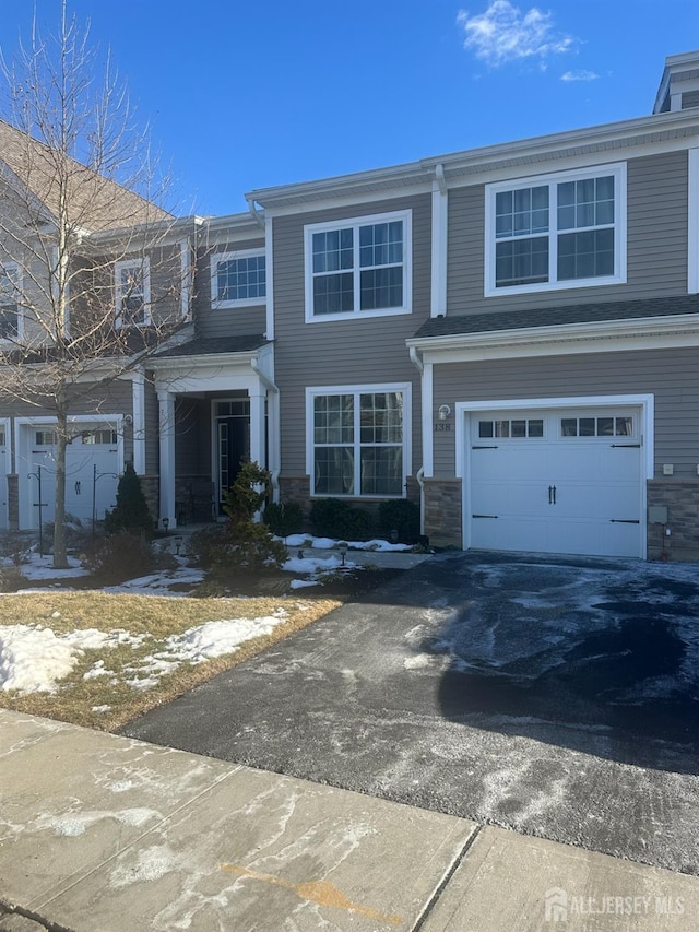 138 N Grabowski Dr Unit 1490, Sayreville, NJ 08859 - townhome / multi-family property with a garage and driveway