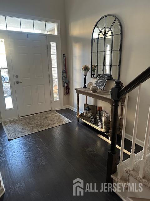 138 N Grabowski Dr Unit 1490, Sayreville, NJ 08859 - foyer featuring dark wood-type flooring and stairs