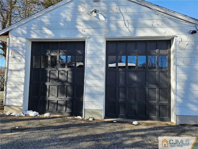 view of outdoor structure with a garage