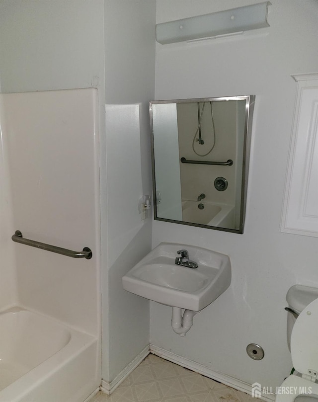 bathroom with sink and toilet