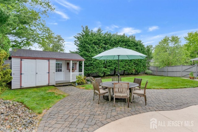 16 Russet Rd, South Brunswick, NJ 08824 - fenced backyard featuring a patio area, an outdoor structure, and outdoor dining area