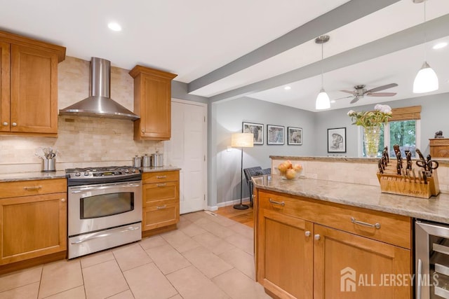16 Russet Rd, South Brunswick, NJ 08824 - kitchen with gas stove, wall chimney exhaust hood, beverage cooler, backsplash, and brown cabinets