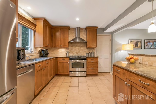 16 Russet Rd, South Brunswick, NJ 08824 - kitchen featuring wall chimney exhaust hood, appliances with stainless steel finishes, light stone counters, decorative backsplash, and brown cabinetry