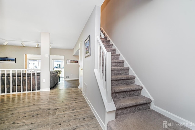 307 Palombi Ct, East Brunswick, NJ 08816 - staircase with wood finished floors and baseboards
