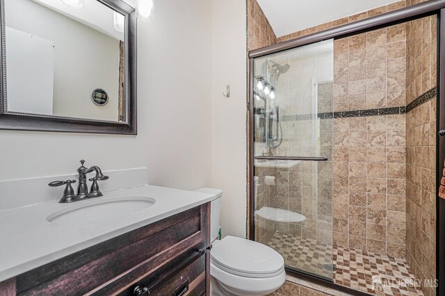 307 Palombi Ct, East Brunswick, NJ 08816 - full bath with a tile shower, toilet, and vanity