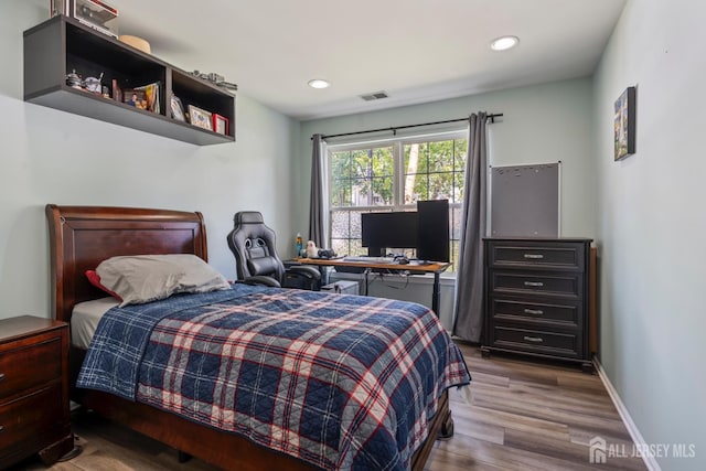 1301 Cypress Ln, East Brunswick, NJ 08816 - bedroom featuring wood finished floors and recessed lighting
