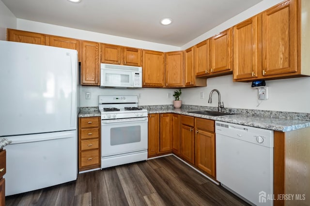 1301 Cypress Ln, East Brunswick, NJ 08816 - kitchen featuring white appliances, recessed lighting, brown cabinetry, dark wood-style floors, and light stone countertops
