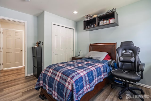 1301 Cypress Ln, East Brunswick, NJ 08816 - bedroom featuring wood finished floors, a closet, and recessed lighting