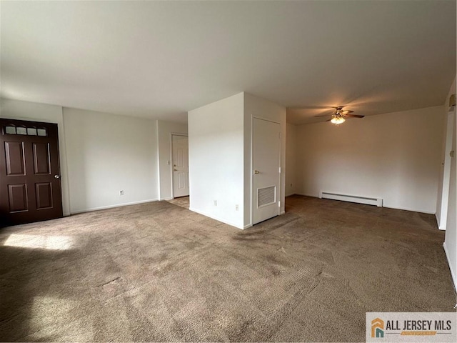 unfurnished living room featuring a baseboard heating unit, a ceiling fan, carpet floors, and baseboards