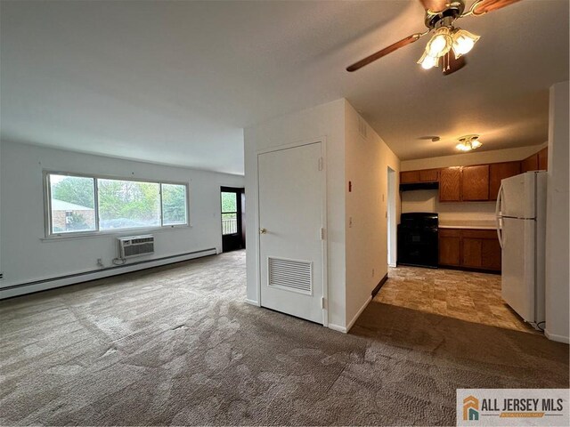 414 Cricket Ln Unit 414, Woodbridge Proper, NJ 07095 - kitchen featuring freestanding refrigerator, range, light colored carpet, brown cabinets, and a ceiling fan