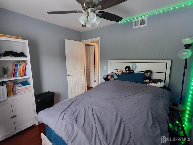 323 Gill Ln Unit 12Q, Iselin, NJ 08830 - bedroom with dark wood finished floors and ceiling fan