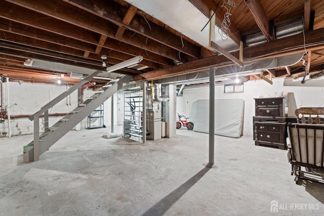 unfinished basement with stairway