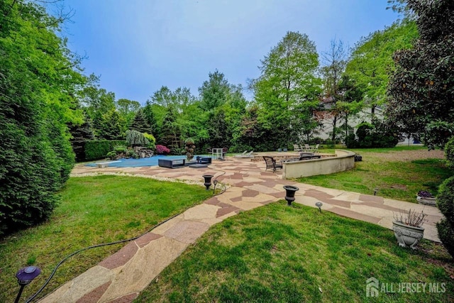 6 Lexington Ct, Monroe, NJ 08831 - view of home's community featuring a patio and a lawn