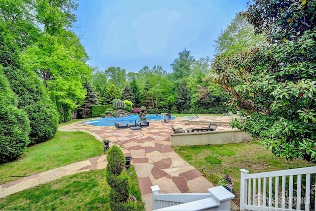6 Lexington Ct, Monroe, NJ 08831 - view of grassy yard with a patio area and an outdoor pool