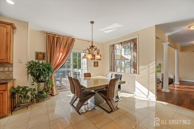 6 Lexington Ct, Monroe, NJ 08831 - dining area featuring light tile patterned floors, decorative columns, baseboards, a chandelier, and recessed lighting