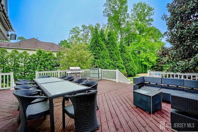 6 Lexington Ct, Monroe, NJ 08831 - wooden deck with outdoor dining area and outdoor lounge area