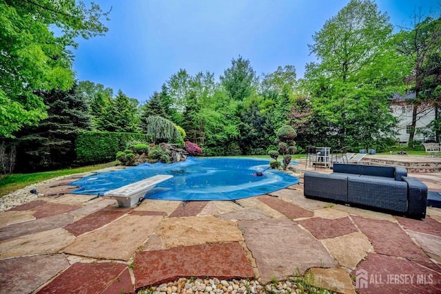 6 Lexington Ct, Monroe, NJ 08831 - view of pool featuring a diving board and a patio