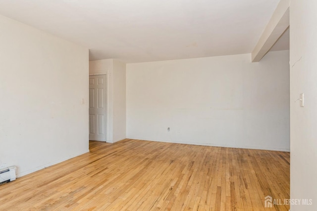 401 US Highway 22nd Rd Unit B8U1, North Plainfield, NJ 07060 - unfurnished room with hardwood / wood-style floors and a baseboard radiator