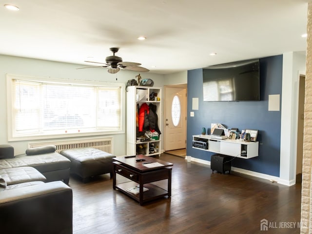 237 Cook Ave, Middlesex, NJ 08846 - living room with dark wood-type flooring, ceiling fan, radiator heating unit, and a wealth of natural light