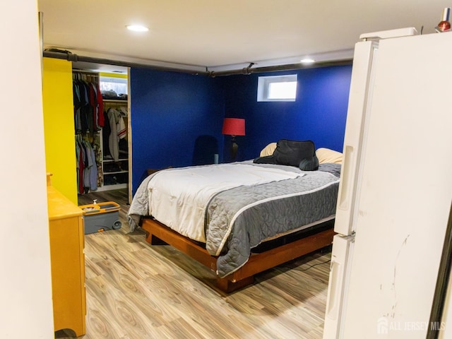 237 Cook Ave, Middlesex, NJ 08846 - bedroom featuring freestanding refrigerator, a closet, recessed lighting, and wood finished floors
