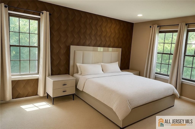 344 Danbury Ln Unit 344, East Brunswick, NJ 08816 - bedroom featuring an accent wall, light colored carpet, and recessed lighting