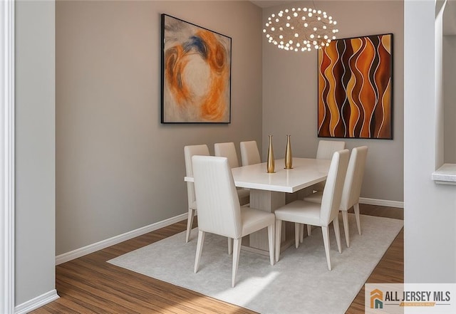 344 Danbury Ln Unit 344, East Brunswick, NJ 08816 - dining space with wood finished floors and a chandelier