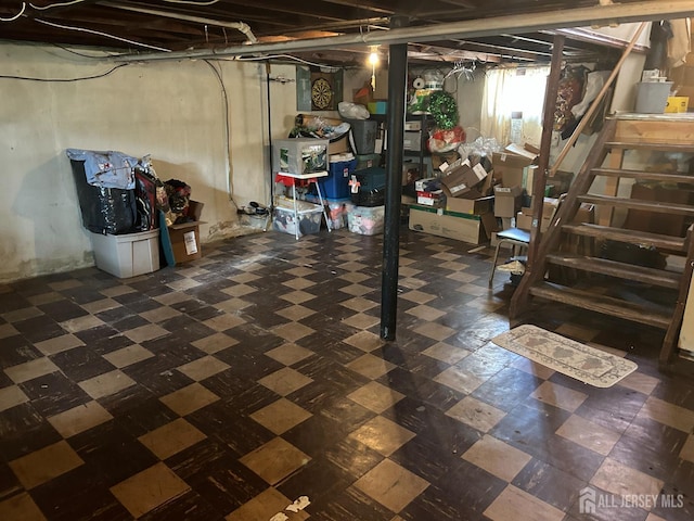 88 Lowell St Unit B, Carteret, NJ 07008 - basement with tile patterned floors and stairway