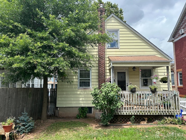 88 Lowell St Unit B, Carteret, NJ 07008 - rear view of house with covered porch