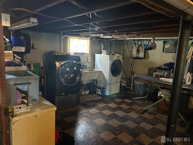 88 Lowell St Unit B, Carteret, NJ 07008 - basement featuring washer and dryer and dark floors